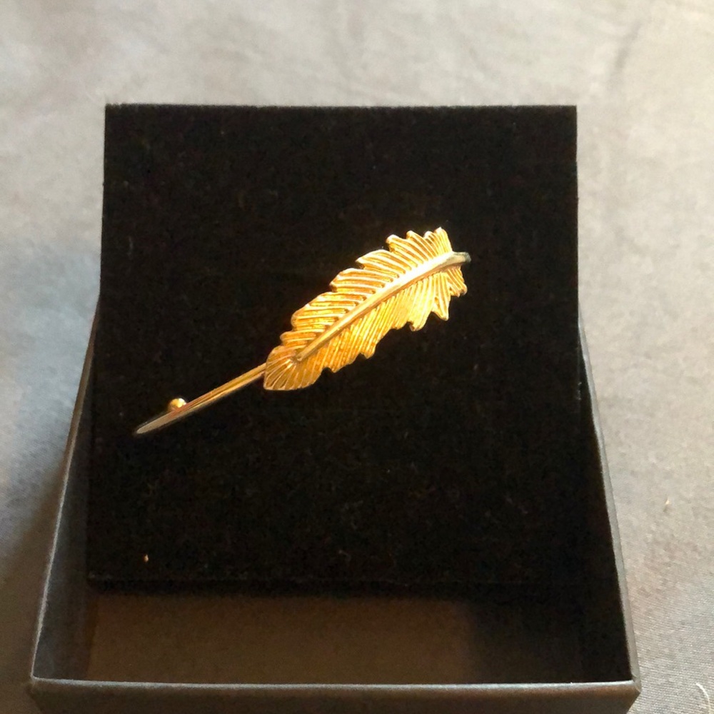 Gold feather bracelet (free with any purchase!)